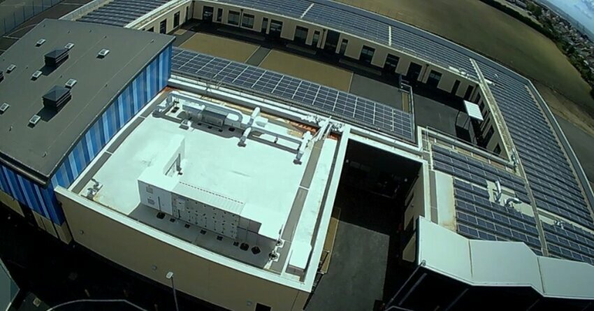 Panelized Construction NZP. Building with Solar Panels on the Roof.