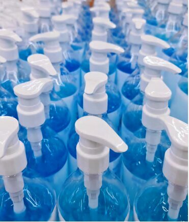 Clean Earth bottles of blue hand sanitizer