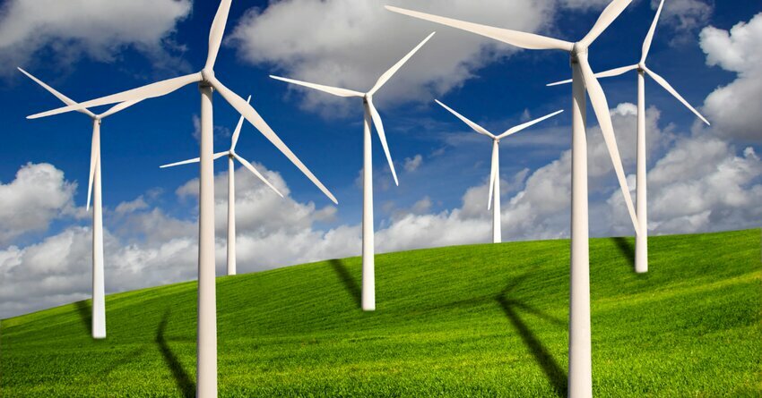 Wind turbines on a green hillside