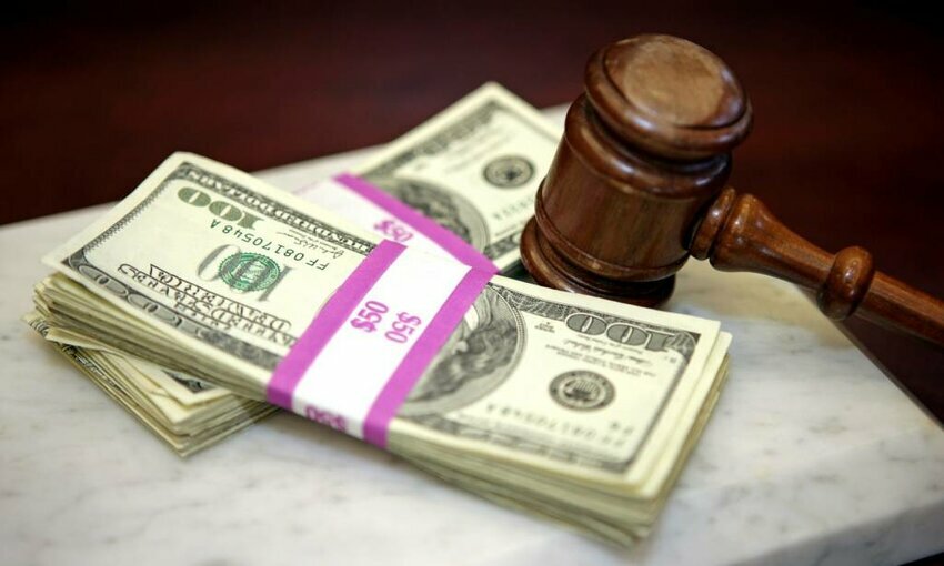 Money and a gavel for a settlement