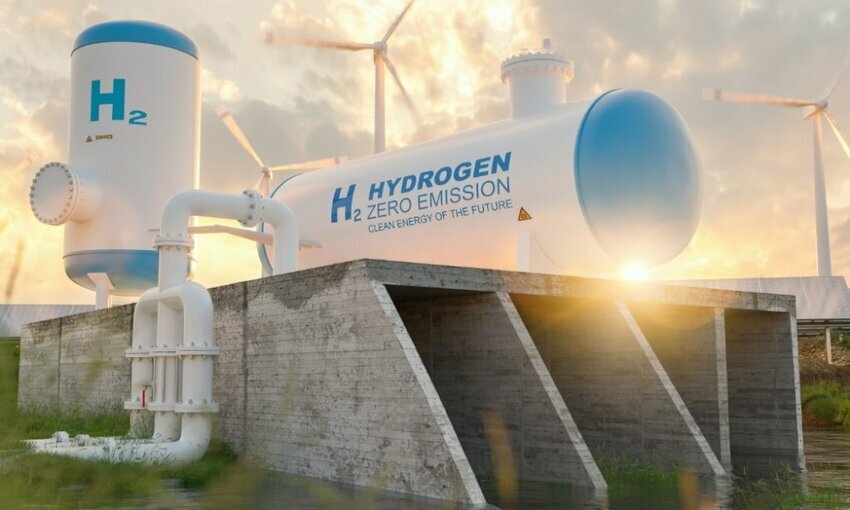 A fabricated hydrogen (H2) plant with water surrounding it.