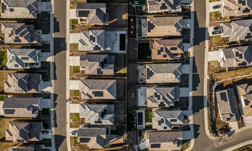 Solar panels on top of house and roofs in California. 