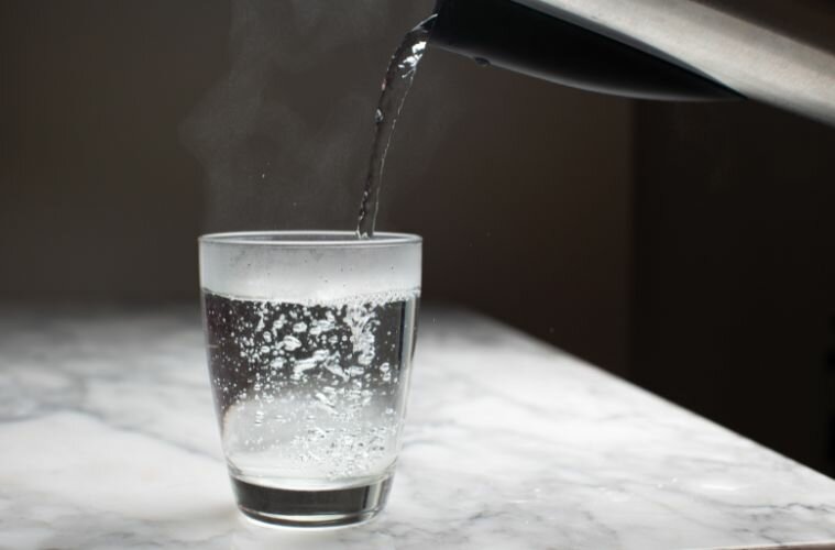 Water Being Poured into a Cup