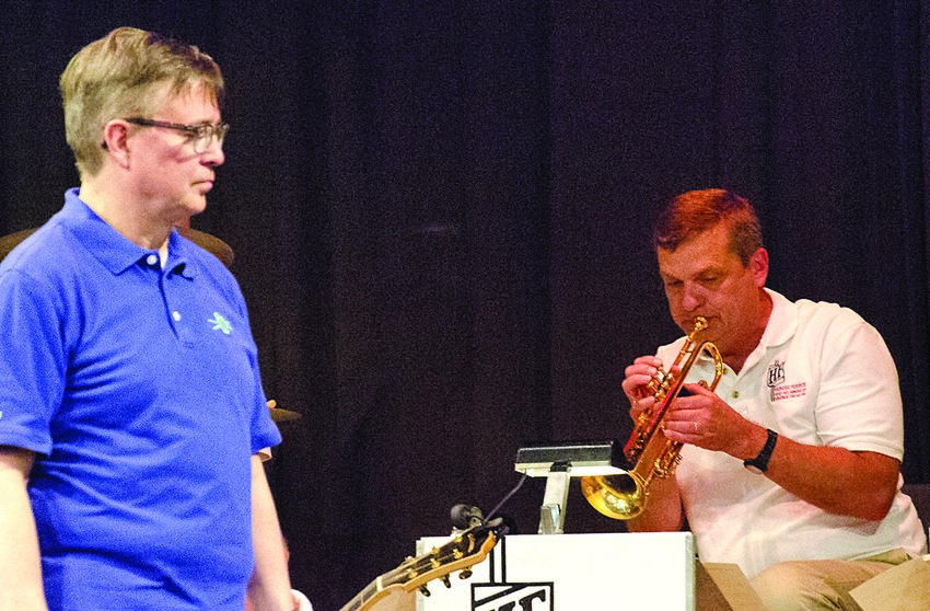Hunter Fuerste and his American Vintage Orchestra will be returning to Turner Hall this coming June. During the big band&rsquo;s last performance here in June 2019, Fuerste, left, listens, as the Rev. Gary Kirst plays a trumpet solo.