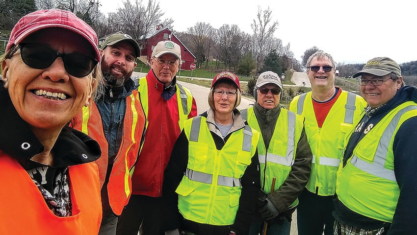 On April 20, Galena Lions Club members&ndash;from left, Lisa Schoenrock, Paul Junge, Ken Zehnder, Paula Singleton, Lenny Hosey, Bob Singleton and Chet Schuler&ndash;donated time to pick up trash as part of Jo Daviess County&rsquo;s adopt-a-highway program. The seven members cleared their designated two-mile stretch of Stagecoach Trail from a half-mile east of Guilford Road to Ford Road. The Jo Daviess County Highway Department in Hanover provided safety vests and garbage bags as well as the rules of the program. Twenty bags of garbage were collected in the three-hour period. The club plans to collect garbage again in July and October. All volunteers active in this program request that travelers decrease their speed upon seeing workers, as well as install waste cans or bags in their vehicles and empty them at home or at a gas station to help maintain the beauty of Jo Daviess County. To learn more, visit galenalions.org or jodaviess.org/highway.