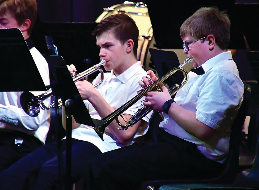 East Dubuque junior high students Charlie Kingsley and Danny Delaney perform Rain Dance by Dean Sorenson during the East Dubuque band concert on May 4.