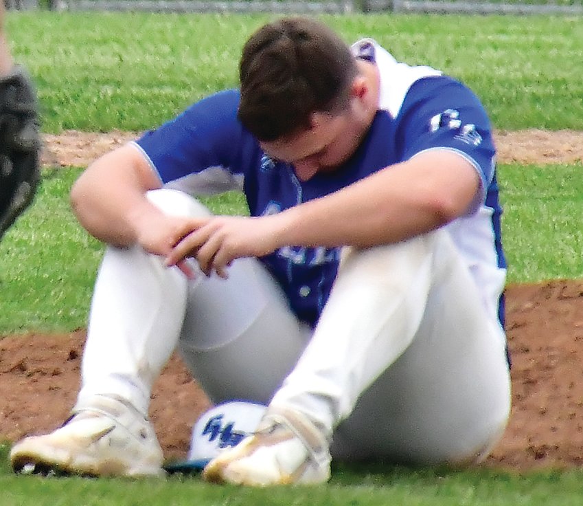 John Wubben hangs his head after the Pirates&rsquo; 3-2 loss to Lena-Winslow on May 20.