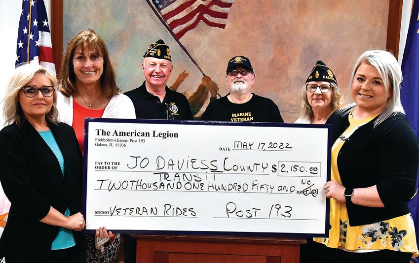 The generous support of Rosean Schromen and Jo Carroll Energy allowed the American Legion to provide a check of $2,150 to subsidize free rides that the Jo Daviess County Transit is providing to area veterans. Pictured are, from left: Amy Johnston, Jo Carroll Energy executive assistant; Rosean Schromen; Jerry Howard, American Legion Post 193 Adjutant; Walter Johnson, American Legion Post 193 commander; Valerie Slaton; and Nicole Hermsen, Jo Daviess County transit director.