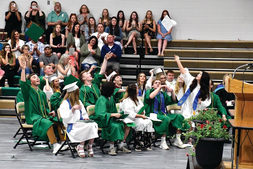 Caps fly into the air as the Scales Mound class of 2022 concluded their commencement ceremony at Scales Mound School gymnasium on May 15.