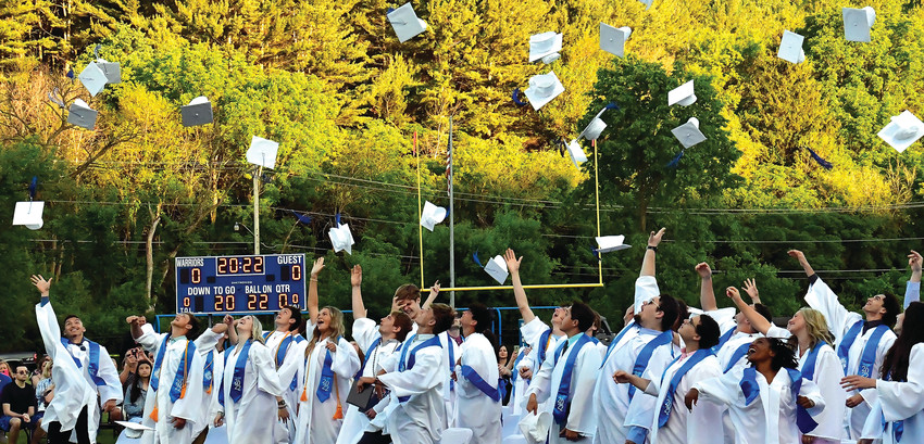 The East Dubuque class of 2022 throws their caps in the air at the conclusion of their commencement ceremony. The ceremony was held at the East Dubuque football field on Friday, June 3.