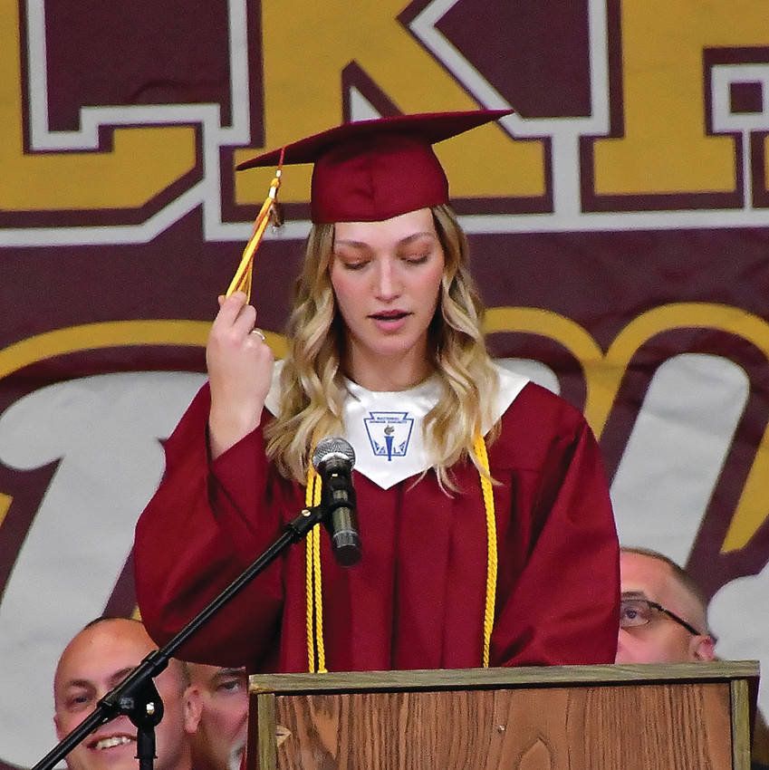 Class president Kenze Haas prepares her class for the turning of the tassels.
