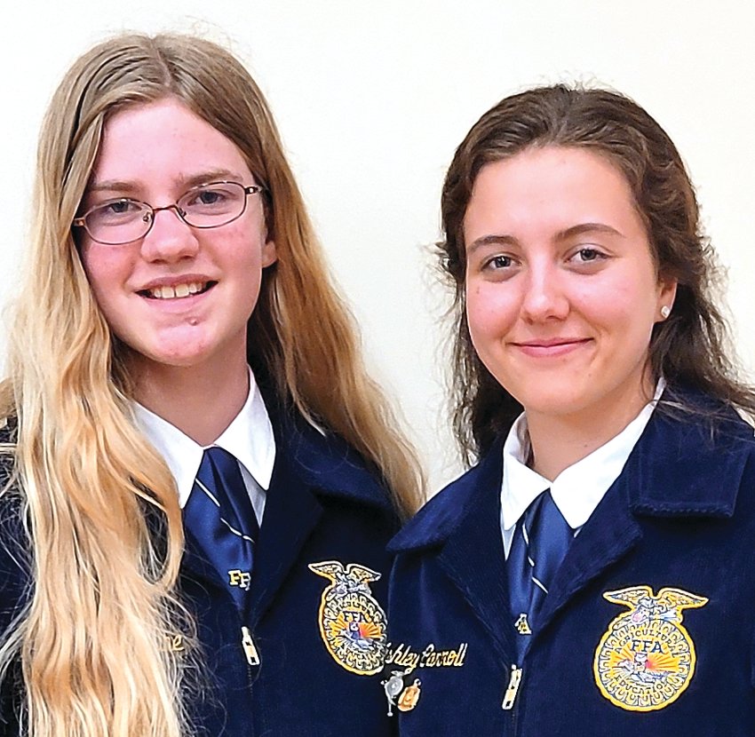 Senior Rive Ridge FFA member Ashley Carroll, right, recently qualified for state in the Job Interview Leadership Development Event. She prepared documents needed for a professional job interview creating a cover letter, completing a job application, crafting a resume and a thank you follow-up letter followed by a phone and in-person interview. FFA members must place first or second in the section contest before moving on to districts. The top three participants qualify for the state contest held in conjunction with the State FFA Convention in Springfield in June. Carroll just completed a year of service as club president and plans on studying pre-veterinary medicine at Iowa State University. Katie Cobine, left, competed in Public Speaking FFA Creed at the districts level.