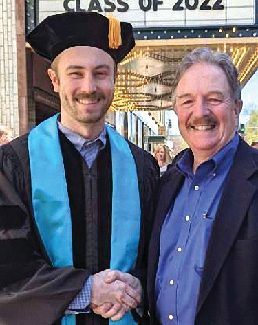 Dr. Crist congratulates Dr. Crist or like father like son. . .Dr. Alan Crist, right, congratulates his son, Joshua, after graduating University of Illinois School of Medicine Rockford on May 7 in front of the Coronado Theater. Joshua is a 2014 River Ridge High School graduate and received his bachelor&rsquo;s degree in 2018 from Trinity International University. Joshua is the son of Sandy and Alan Crist. He and his wife, Morgan, have a son, Walter, 5 months.