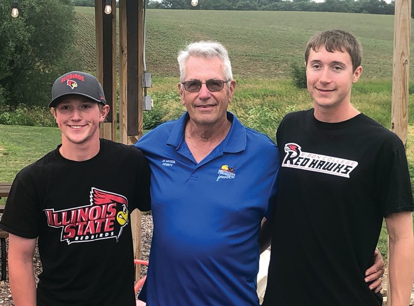 Blaze Janecke (left) of Warren High School and Caleb Mammoser (right) of Stockton High School were recipients of $500 scholarships for the 2022-2023 school year from the Jo Daviess County chapter of Pheasants Forever.  In the middle is Pheasants Forever representative Jim Nielsen.