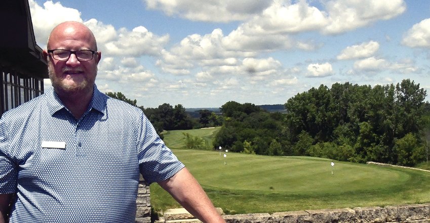 Steve Geisz, the new general manager at Eagle Ridge Resort &amp; Spa, relaxes on the deck of the Highland&rsquo;s Restaurant. Behind him is the putting green and first fairway of The General golf course. The deck also overlooks the course&rsquo;s 10th and 18th holes.