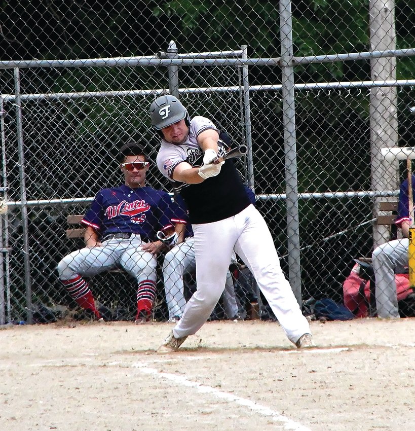 Nate Mowry of the Shullsburg Fever takes a swing during their game against the Wiota Indians on July 10. The Fever won 4-3 at Badger Park.