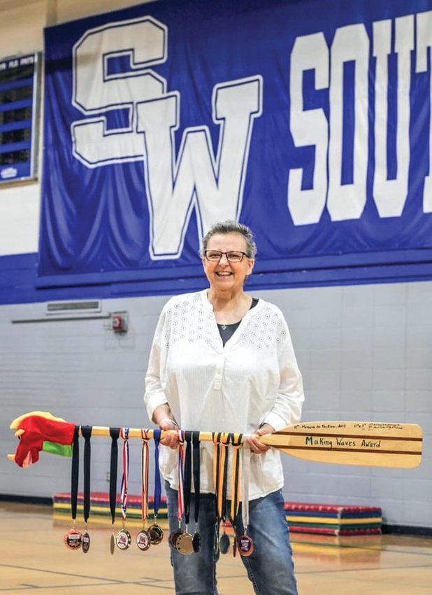 Tina Wright was involved in the lives of her students at Southwestern. She even got her students involved with dragon boat racing.