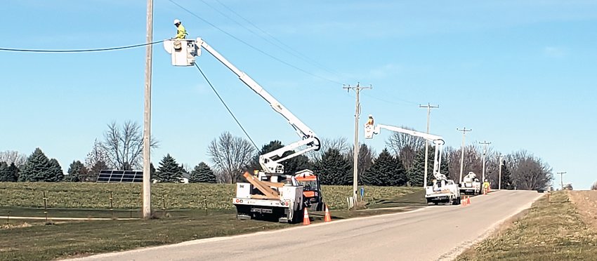 Construction crews are building the aerial mainline fiber along Red Gates Road in rural Galena.