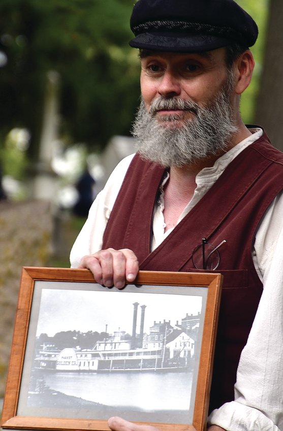 Capt. Hiram Bersie (Michael Crawford) shows off his riverboat, the Golden Era, at the 28th annual Cemetery Walk at Greenwood Cemetery.