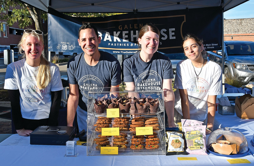The Galena Bakehouse team composed of (from left) Emma Furlong, Alex Arroyo, Pam Franson and Sumr Al-hamdani served some of their baked goods as well as some empanadas and rice (Not Abuela&rsquo;s Rice &amp; Beans).