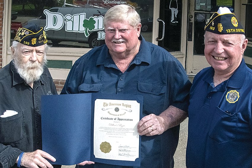 The Galena American Legion post has recognized two Galena citizens with certificates of appreciation. Here, Legion Chaplain Mike Figueroa, left, and Cmdr. Jerry Howard, present a certificate to Bobby Hahn as the representative from Dillon&rsquo;s and Louie&rsquo;s Trenching.