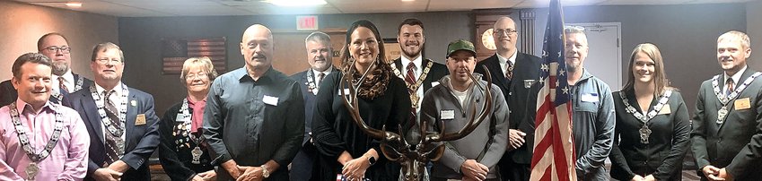 The Galena Elks welcomed four new members at its Oct. 18 meeting. Participating in the initiation are, from left, Loyal Knight Gavin Doyle, Inner Guard Mike Greene, Lecturing Knight Jeff Klein, Tiler Mary Jo Copeland, Stan Waznis, Esquire Tom Long, Brianne Van Hemert, Exalted Ruler Tyler Long, Mitch Gaherty, Chaplain Luke Virtue, Charles Barry, Treasurer Amber Feldermann and Leading Knight Luke Einsweiler.