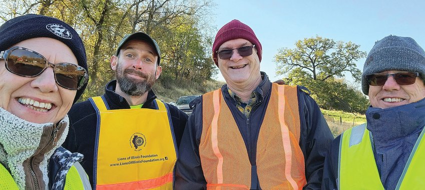 It was a chilly Adopt-A-Highway day for the four Galena Lions Club members&ndash;from left, Lisa Schoenrock, Paul Junge, Bob Singleton, and Lenny Hosey&ndash;who cleaned up garbage from the designated stretch of Stagecoach Trail on October 19. Two large bags of debris were collected. The Galena Lions Club not only assists with sight and hearing needs and provides donations to community organizations but also takes measures towards protecting our natural environment. All entities in this program greatly appreciate the public&rsquo;s cooperation in slowing down when workers are seen, as well as keeping garbage off the roadways. To learn more, visit galenalions.org or jodaviess.org/highway.