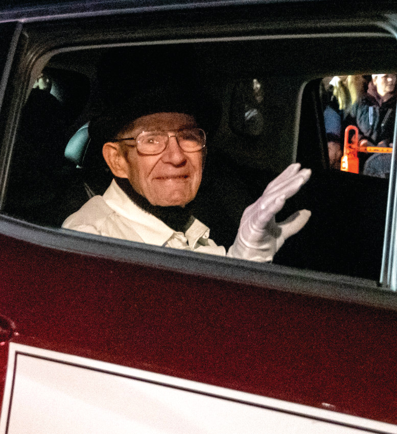 Grand marshal Carl Johnson waved to the crowd as he progressed down Main Street.