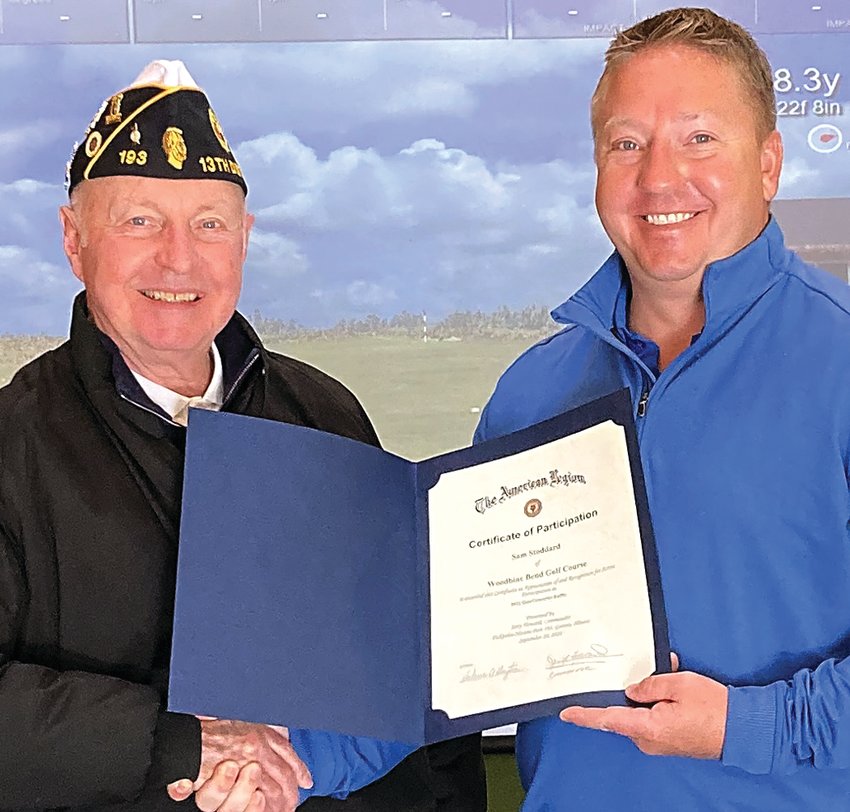 Jerry Howard, left, Fickbohm-Hissem Post 193 commander, presents a certificate of appreciation to Sam Stoddard, Woodbine Bend Golf Course general manager, in appreciation of Woodbine Bend&rsquo;s fundraising help this year and for its community support.