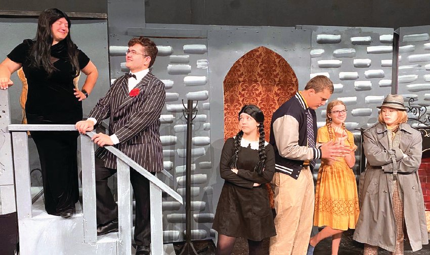 River Ridge High School Drama Department presents The Addams Family. Nov. 11-12 at 6 p.m. at River Ridge High School. Cast members include, from left, Morticia Addams (Cora Dittmar), Gomez Addams (Lucius Mendenhall), Wednesday Addams (Ruby Dickerson), Lucas Beineke (Nate Haas), Alice Beineke (Katie Cobine) and Mal Beineke (Emma Smallwood). Director is Thomas Taylor assisted by Lisa Haas. Tickets available at the door.
