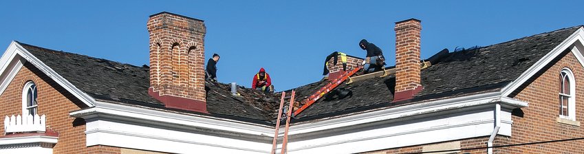 Workers from Sterling Commercial Roofing, Sterling, made temporary repairs to the Washburne House State Historic Site last week. The shake shingles were in deteriorating condition. Many had been blown off during recent high winds. Terry Miller, site superintendent said replacement of the roof was put out to bid three times this year but no bids were received. Last week&rsquo;s repairs are expected to get the home through the winter months. The project will be put out for bid a fourth time. The goal is to have the roof replaced in the first half of the year.