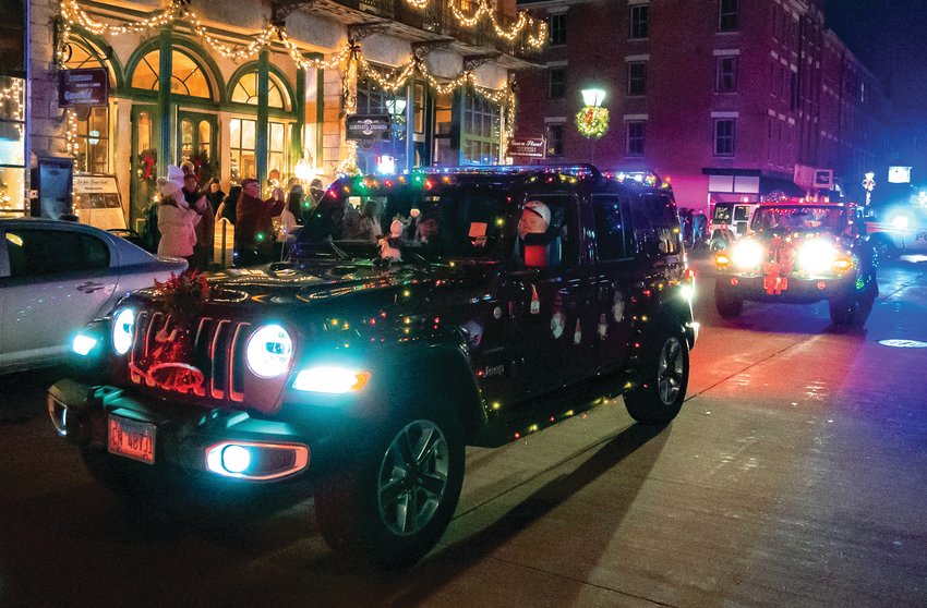 Santa and Mrs. Claus arrived in Galena during the Jeep Jingle Parade on Saturday evening, Nov. 26. Participating Jeep owners decorated their cars, delivered Santa and helped to raise money for Riverview Center all at the same time.