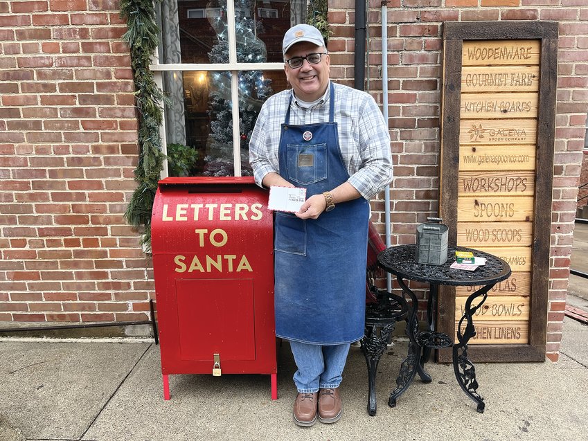Paul Pendola is all set to accept Santa letters at his special Santa mailbox outside his business, Galena Spoon Co.