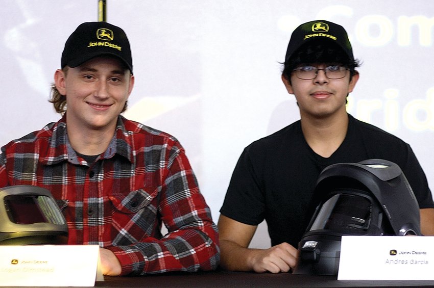 East Dubuque High School has entered into a welding apprenticeship/partnership program with John Deere, Dubuque Works. The partnership allows for two students to receive welding training by professional welders in John Deere&rsquo;s welding lab. On Friday, Dec. 16, East Dubuque students, Logan Olmstead, left, and Andres Garcia signed their apprenticeship contracts.