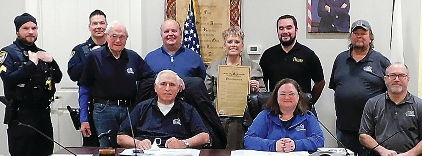 After proclaiming January as National Human Slavery and Human Trafficking Prevention Month, the East Dubuque City Council posed for a photo, back, from left, Sgt. Cody Lange, Police Chief Luke Kovacic, Delbert Belken, Mike Hoffman, Casey Klein, Jacob Walsh, Tim Fluhr and front, from left, Mayor Randy Degenhardt, City Clerk Pam McCarthy and Jeff Bergman.
