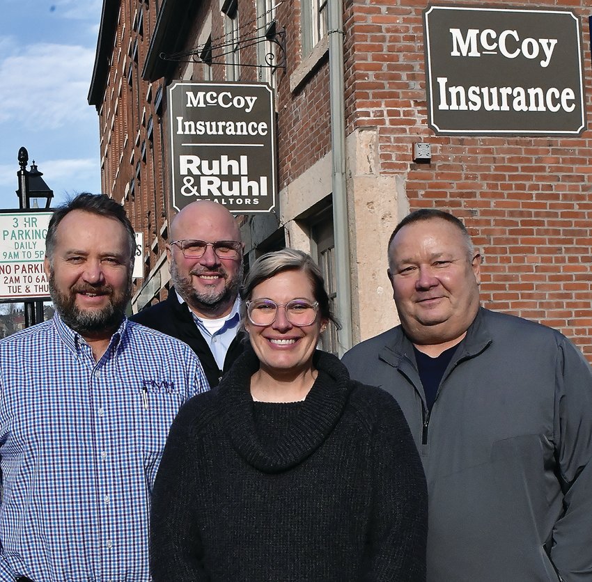 The new owners of McCoy Insurance Agency are, from left, Peter Huschitt, Tim Timpe, Tina Ertmer and Michael &ldquo;Woody&rdquo; Woodward.