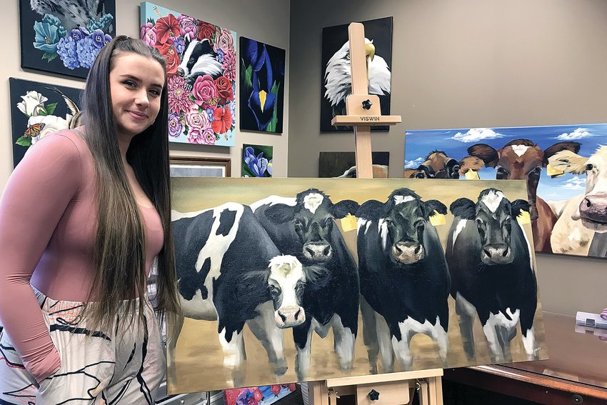 Courtney Knockel, Cuba City, Wis., shows her newly painted, &ldquo;Dairyland&rdquo; that will be exhibited at the Galena Center for the Arts.