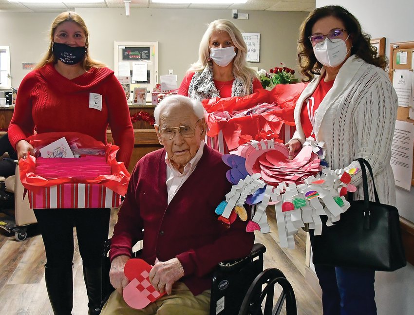 Jackie Debes, Wendie Horton and Diane Altfillisch gave cards, candy and art projects to the residents in the nursing home, such as Wayne Haas.