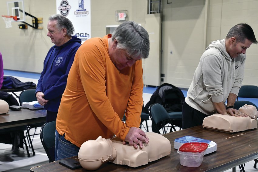 The Galena Area Emergency Medical Service hosted automated external defibrillator (AED) training at the Galena ARC on Saturday, February 18. Six people attended the training session held in the ARC&rsquo;s gym. While this training was not a certification class, those in attendance learned how to perform manual CPR and use an AED. This free training was open to the public. Here, Dave Decker and John Rosenthal practice their chest compressions as EMS Coordinator Bill Bingham watches another group practice behind Decker and Rosenthal.