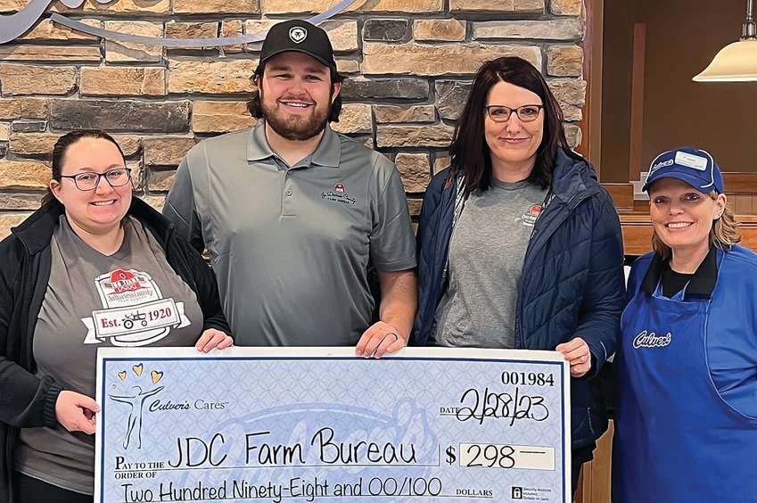 Culver&rsquo;s hosted a Share Night for the Jo Daviess County Farm Bureau on Feb. 28 and earned $298 for its efforts. Participating in the check passing are, from left, Codie Koester, Nathan Koester, Annette Eggers and Sara Wentz.