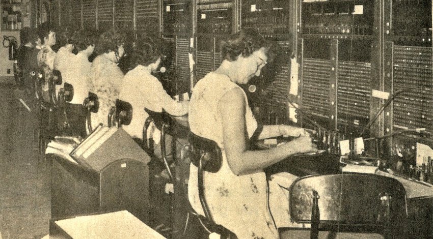 Cutline from the July 16, 1964 Galena Gazette: Galena&rsquo;s manual 12-position switchboard which will be replaced Sunday by the new dial system. The original seven positions of switchboard were installed at 202 1/2 S. Main St. in 1918, and the last two positions were added at the same address in 1953. Gazette file photo