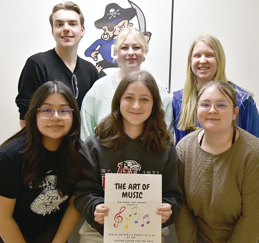 Galena High School National Art Honor Society Officers pose with the art show flyer they created. Back row, from left: Charles Duncan, Emma Blaum, Emma Furlong. Front row, from left: Mafe Lopez, Chloe Roland, Reagan Simpson.
