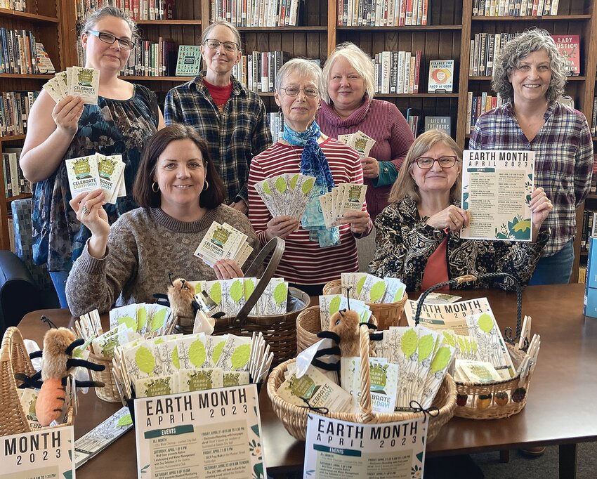 Green Team members making Earth Day baskets for the community. From left to right, back: Larissa Distler, Beth Baranski, Pam Bernstein, Hendrica Regez, Mary Edwards. Front: Hillary Dickerson, Patricia Allen-Stewart.