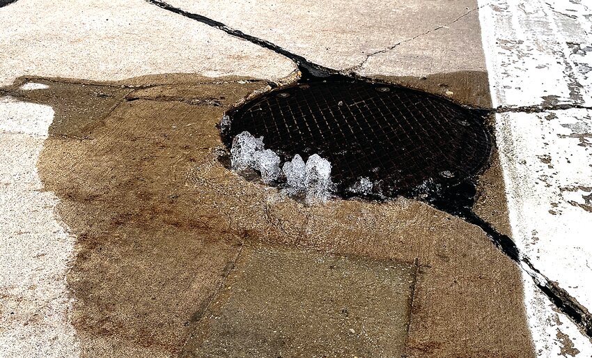 Water has been bubbling up from a few manholes in the downtown area. The photo above was taken on Monday, April 24 on Green St.
