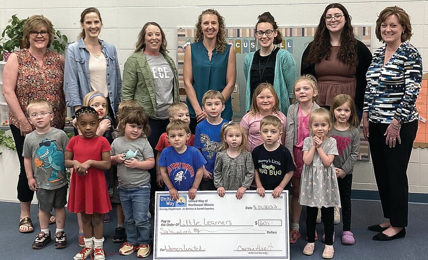 On Friday, April 14 the Jo Daviess County Women United members presented a check to the CTE Little Learners Academy for their quarterly meeting in March. The CTE Little Learners Academy is an early childhood education class that provides students the opportunity to explore several avenues all wrapped into one, and is a preschool program that provides high quality childcare. The Jo Daviess County Women United is a premier women&rsquo;s organization that creates a meaningful sense of belonging while strengthening the community through philanthropy, leadership &amp; volunteerism. Back row, from left: Carol Jordan (Women United member), Renee Dieschbourg (Women United member), Stacy Kloss (CTE Academy staff), Nicole Haas (Women United member), Katrina Larson (CTE Academy staff), Amber Hupperich (CTE Academy staff) and Janelle Keeffer (Women United member.) Middle row, from left: Indigo Wiley, Carter Bingham, Trevor Bradt, Bella Miller, Zoey Bussan, and Blakeli Neuschwander. Front row, from left: Landon Offenheiser, Lovey Ransom, Finley Potter, Ivan Offenheiser, Emily Bradt, Everette Hofetender, and Journey Brown.