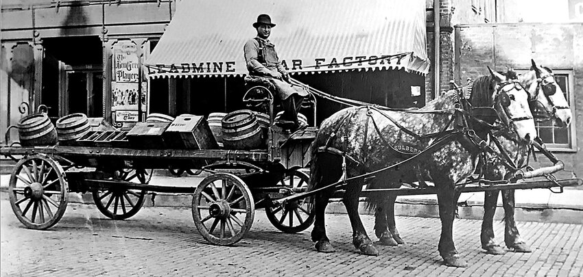 Delivery, whether along the riverfront of the Galena River, by train, horse-drawn carts and now trucks, has long been a part of commerce here. Eulberg horses provide the horsepower to deliver beer and other goods on Main Street.
