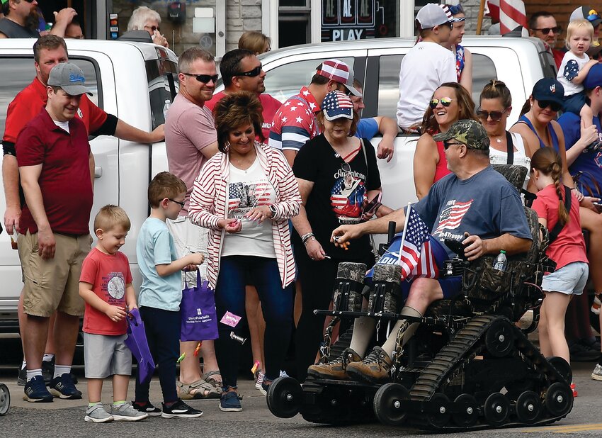 Different individuals and groups participated in the East Dubuque Memorial Day parade. Some handed out candy to kids in attendance.
