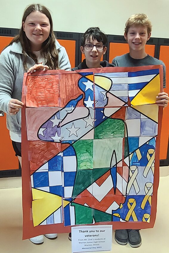 Students in Mr. Joel Zink&rsquo;s social studies classes at Warren Junior High School learned about the origins and meaning of Memorial Day. They completed a Memorial Day pop art poster project and shared the posters with veterans at local nursing homes. Here, Emily VanRaalte, Chase Bennett and Beau Podnar pose with their poster.