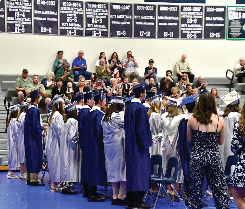River Ridge graduates turned around to be presented to the crowd at the end of the ceremony.