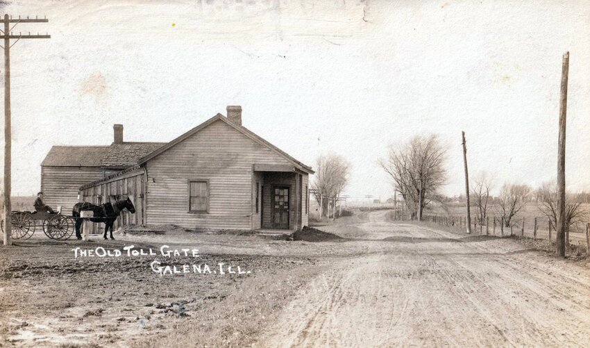 This is a postcard photo of the Old Toll Gate along the Galena Tollroad.